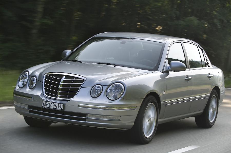  Kia Opirus 2003 года  (фото 47 из 54)